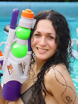 Amazing Tranny Nikki posing in the pool
